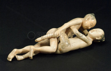 Ivory figurine of a loving couple  Chinese.