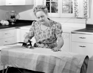 Woman ironing  1950.