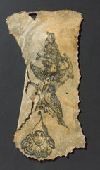 Human skin  tattooed with three birds and clown's head  French  1850-1920.