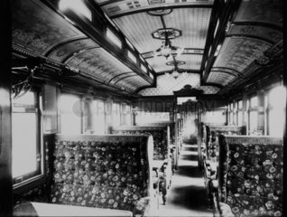 Interior of a third class dining car.