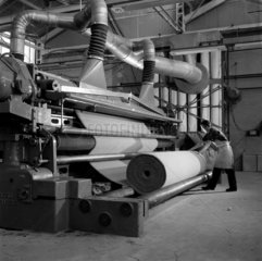 Factory worker with carpet shearing machine  Kossett Carpets  1956.