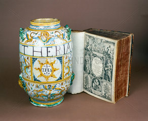 Albarello drug jar  Italian  1641  and a copy of ‘Gerarde’s Herball’  1633.