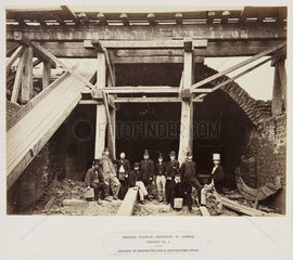 Contractor's staff in the archway of Pancras cellars  London  c 1867.