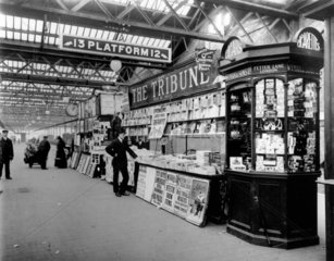 Newsagent's stand  Euston station  London  c 1908.