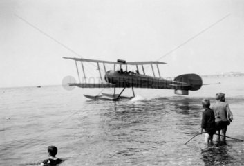 Sea-plane prepares for take-off  c 1920s.