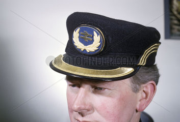 British Rail employee wearing cap with company badge  April 1964.