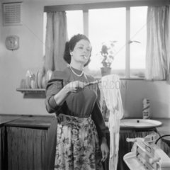 Woman doing washing  1955