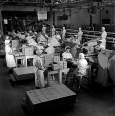 Teams of female workers packing “Rolo � chocolates at Mackintosh’s  1958.