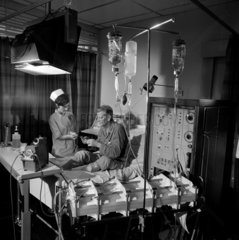 Royal Free Hospital Renal Unit patient and nurse with dialysis machine  1968.