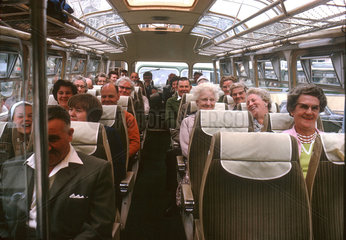 Passengers on a bus  Essex  1963.