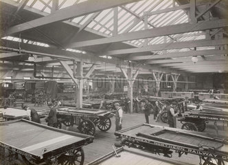 Painting drays at Doncaster works  South Yorkshire  c 1916.