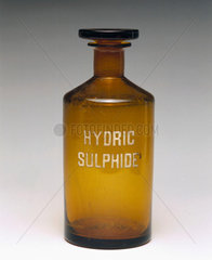 Brown glass reagent bottle labelled ‘HYDRIC SULPHIDE’  1940.