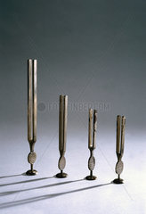 Four tuning forks invented by Gardiner Brown  c 1841-1930.