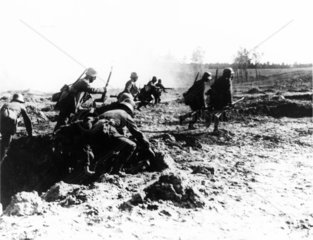 Soldiers attack during a battle on the West