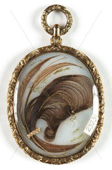 Pendant containing a lock of hair  c 1850