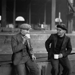 Barge captain drinking tea  c 1950.