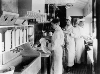 Chef with his staff at work in GER kitchen  Norfolk Coast Express  1907.