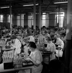 A team of female workers assemble cathode ray tubes  Mullards  1956.