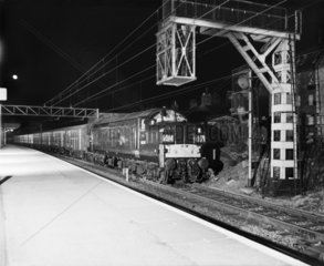 Freight train carrying cars  Essex  1963.