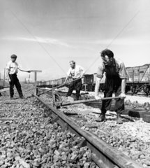 A team install railway track made at the Darlington Railway Company  1966.