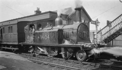 NBR steam locomotive and passenger train  c 1900s.