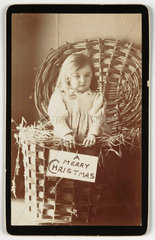 Child in basket  c 1875.
