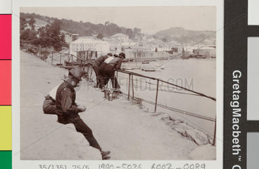 Snap-shot of the Newlyn harbourside  c early 20th century.
