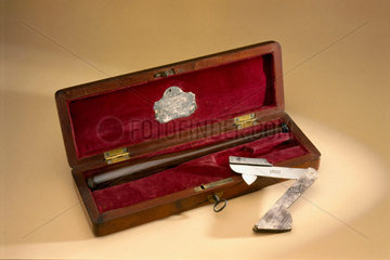 Steel fleam and bloodstick in mahogany case  1850-1853.