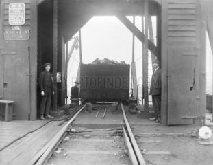 Wagon loaded with coal in a shed at Garston docks  Liverpool  c 1926.