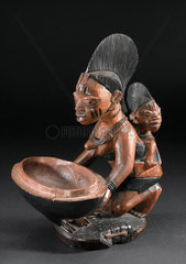 Carved wooden divination bowl  Nigeria  1880-1920.