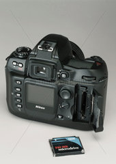 Rear view of the Nikon D100 digital SLR camera with memory cards  2002.