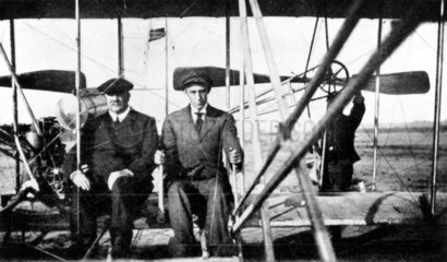 Wilbur Wright with Frank Hedges Butler  Anvours France  1908.