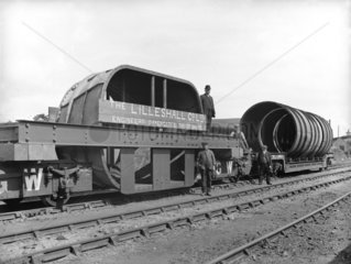 Goods train carrying mining equipment  Oakengates Station  Shropshire 1911.
