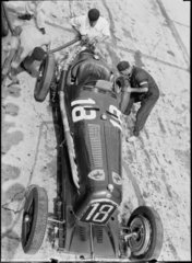 Louis Chiron’s Alfa Romeo in the pits  1930s.