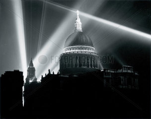 St Paul's Cathedral illuminated on the night of VE Day  London  8 May 1945.