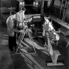 Engineers making a beam test in cement lab  Cambridge  1958.