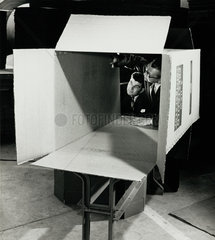 Managers look through large corrugated box on inspection visit  Tillotson’s  1956.