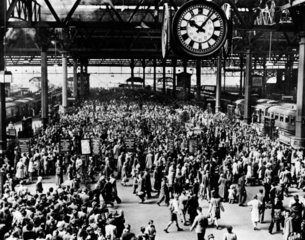 Holiday crowds at Waterloo Station  London  1946.