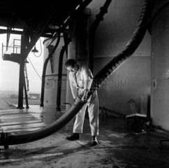Man with chemical pipe  ICI   West Thurrock  1955.