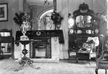 Fireplace in an Edwardian drawing room  c 1