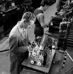 Two workers assemble Gestetner machines  1954.