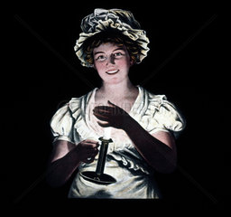 Woman holding a candle  mid 19th century