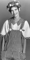 Woman wearing gingham dungarees  January 1985.