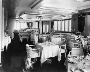 View of dining room of Cunard liner  9 April 1954.