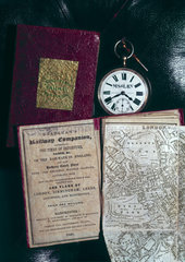 Pocket watch with a copy of Bradshaw's Railway Companion  19th century.