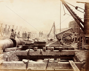 Laying timber on the Metropolitan District Railway  London  c 1868.