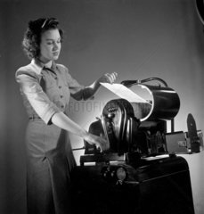 Miss Bartlett with the new Roneo 500 /II duplicating machine  1955.