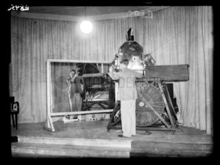 Demonstrating the Scophony television  1936.