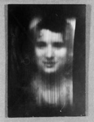 A woman's face as received on 30-line television  c 1930s.