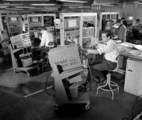 A team of engineers build computers  at Elliot Automation  Borehamwood  1966.
